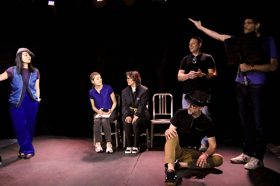 The Man v Machine cast mid-show on the Dog Story Theater stage